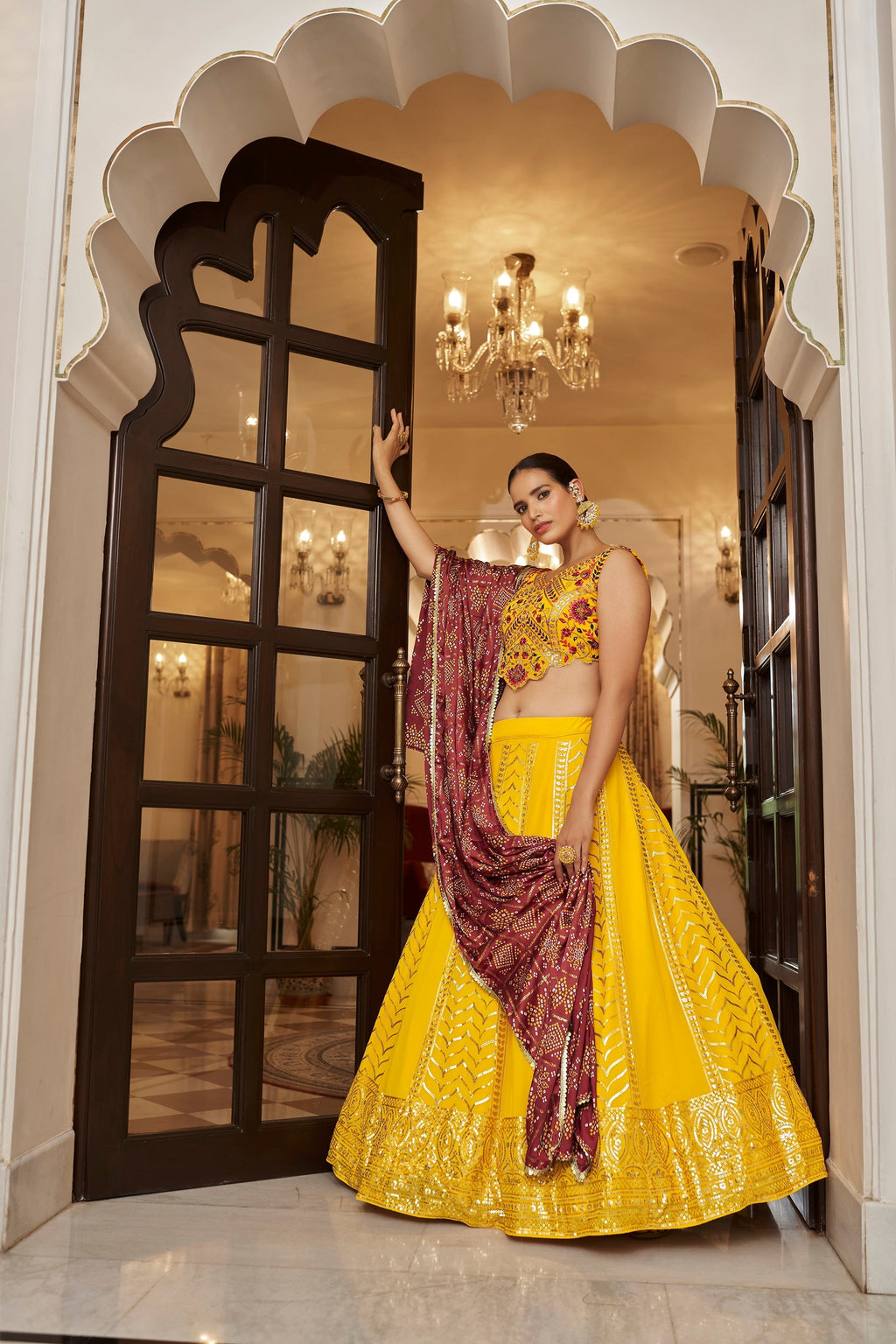 Yellow With Maroon Color Embroidered Semi Stitched Bridal Lehenga Choli Clothsvilla