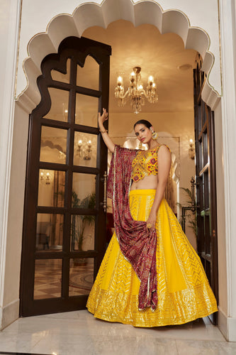 Yellow With Maroon Color Embroidered Semi Stitched Bridal Lehenga Choli Clothsvilla