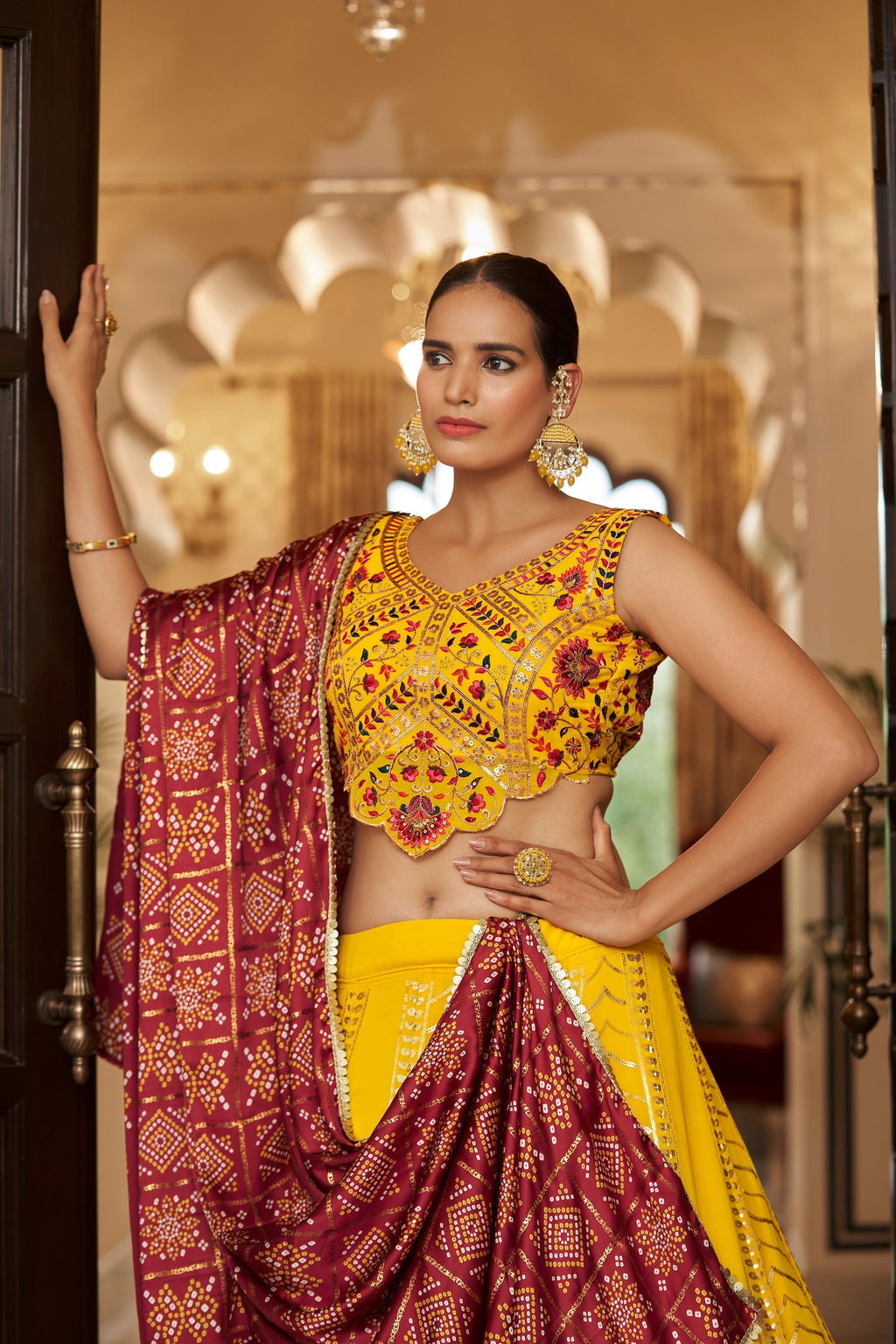 Yellow With Maroon Color Embroidered Semi Stitched Bridal Lehenga Choli Clothsvilla