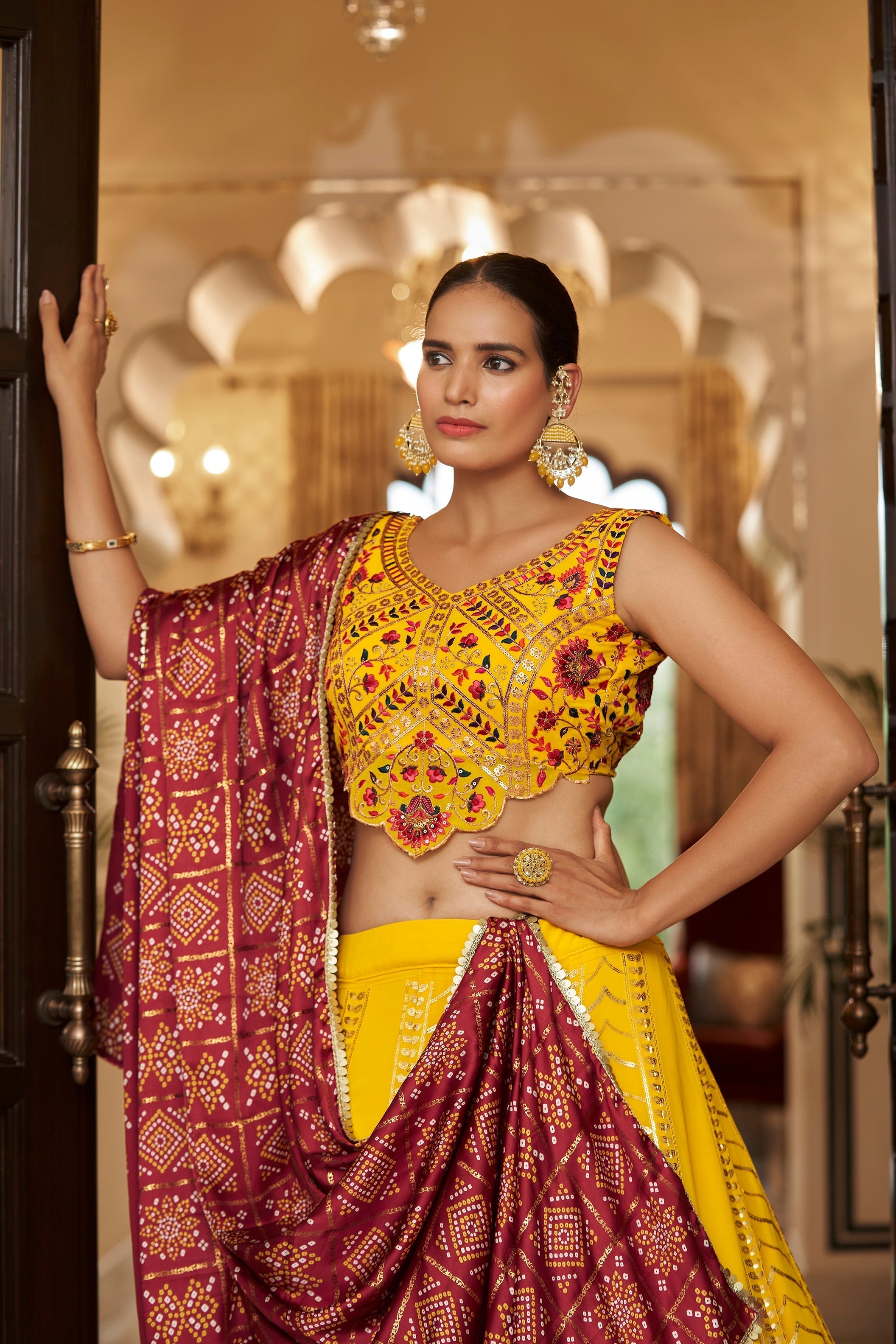 Yellow With Maroon Color Embroidered Semi Stitched Bridal Lehenga Choli Clothsvilla