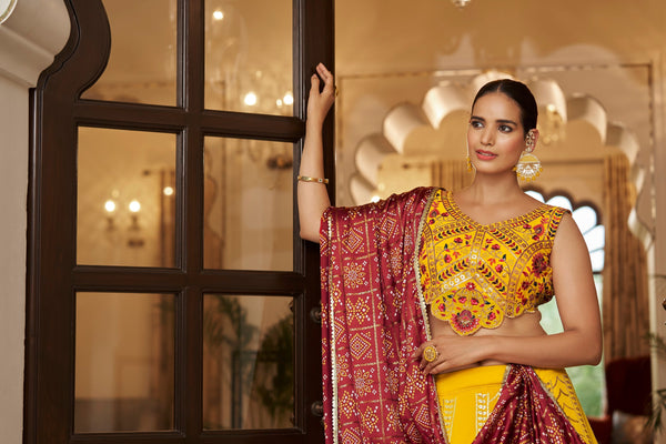 Yellow With Maroon Color Embroidered Semi Stitched Bridal Lehenga Choli Clothsvilla