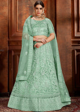 Load image into Gallery viewer, Pista Green Soft Net Lehenga Choli with Thread, Zarkan &amp; Pearl work Clothsvilla