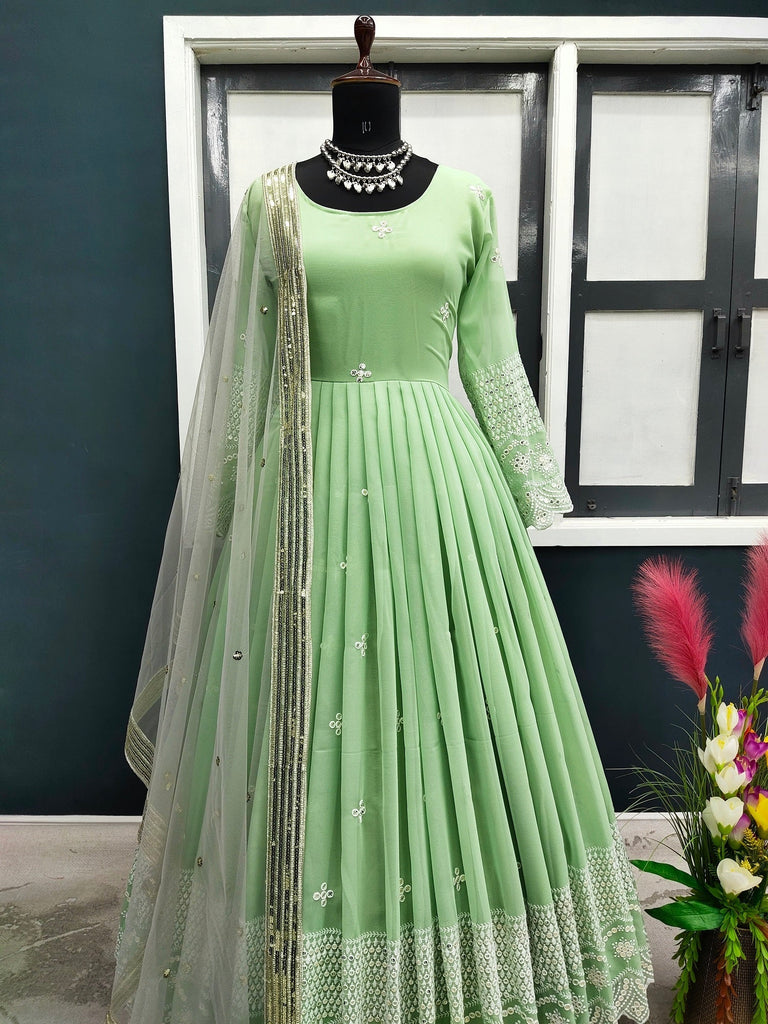 Marvelous Pista Color Embroidery Thread Work Gown Clothsvilla
