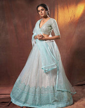 Load image into Gallery viewer, Lehenga Choli in Soft Net Fabrics with Resham Work and Grey Color ClothsVilla