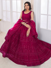 Load image into Gallery viewer, Magenta Soft Net Embroidered Semi Stitched Lehenga Choli Clothsvilla