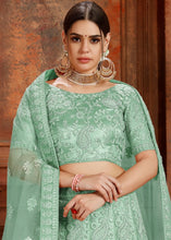 Load image into Gallery viewer, Pista Green Soft Net Lehenga Choli with Thread, Zarkan &amp; Pearl work Clothsvilla