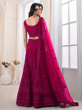 Load image into Gallery viewer, Magenta Soft Net Embroidered Semi Stitched Lehenga Choli Clothsvilla