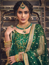 Load image into Gallery viewer, Green Embroidered Soft Net Semi Stitched Lehenga With Unstitched Blouse Clothsvilla