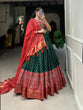 Load image into Gallery viewer, Green Color Bandhani And Ajrakh Print With Foil Work  Dola Silk Chaniya Choli Clothsvilla