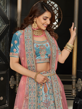 Load image into Gallery viewer, Sky Blue Velvet Semi Stitched Lehenga With Unstitched Blouse Clothsvilla