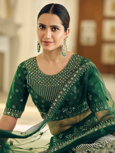 Load image into Gallery viewer, Green Embroidered Soft Net Semi Stitched Lehenga With Unstitched Blouse Clothsvilla