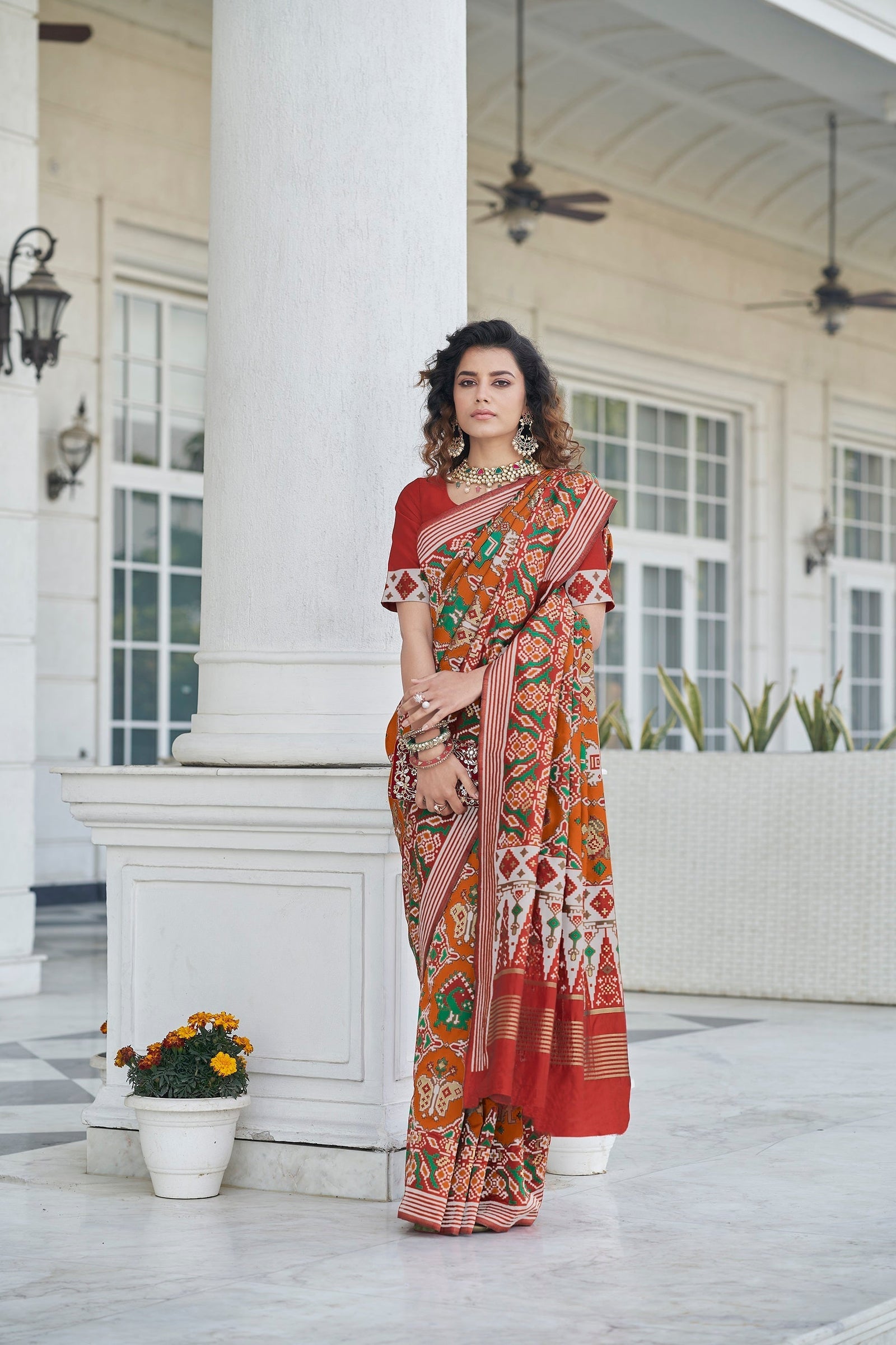 Function Wear Orange Color Patola Silk Saree Clothsvilla