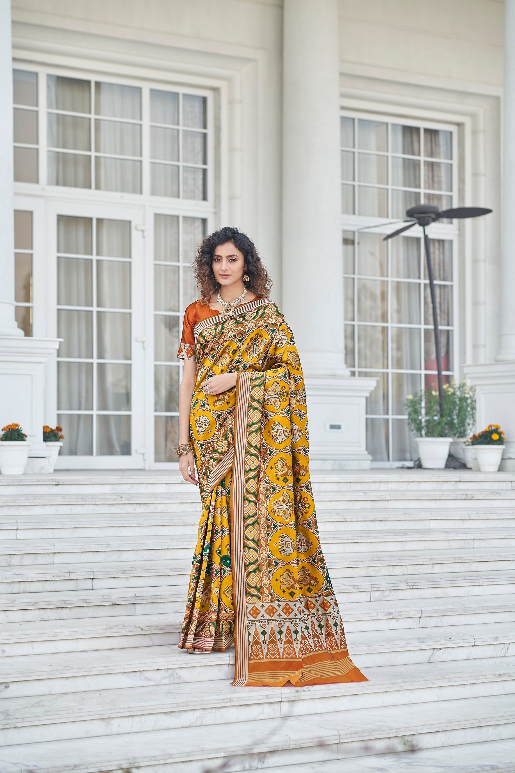 Function Wear Mustard Color Patola Silk Saree Clothsvilla
