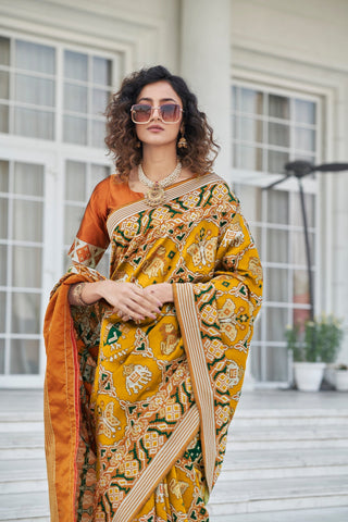 Function Wear Mustard Color Patola Silk Saree Clothsvilla
