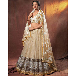 Beige Colored Lehenga Choli with Resham, Zari, and Sequence Work ClothsVilla