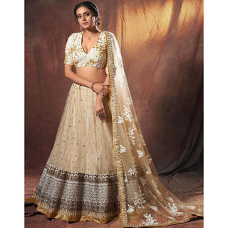 Beige Colored Lehenga Choli with Resham, Zari, and Sequence Work ClothsVilla