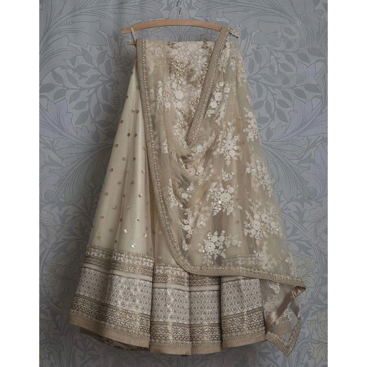 Beige Colored Lehenga Choli with Resham, Zari, and Sequence Work ClothsVilla Main image
