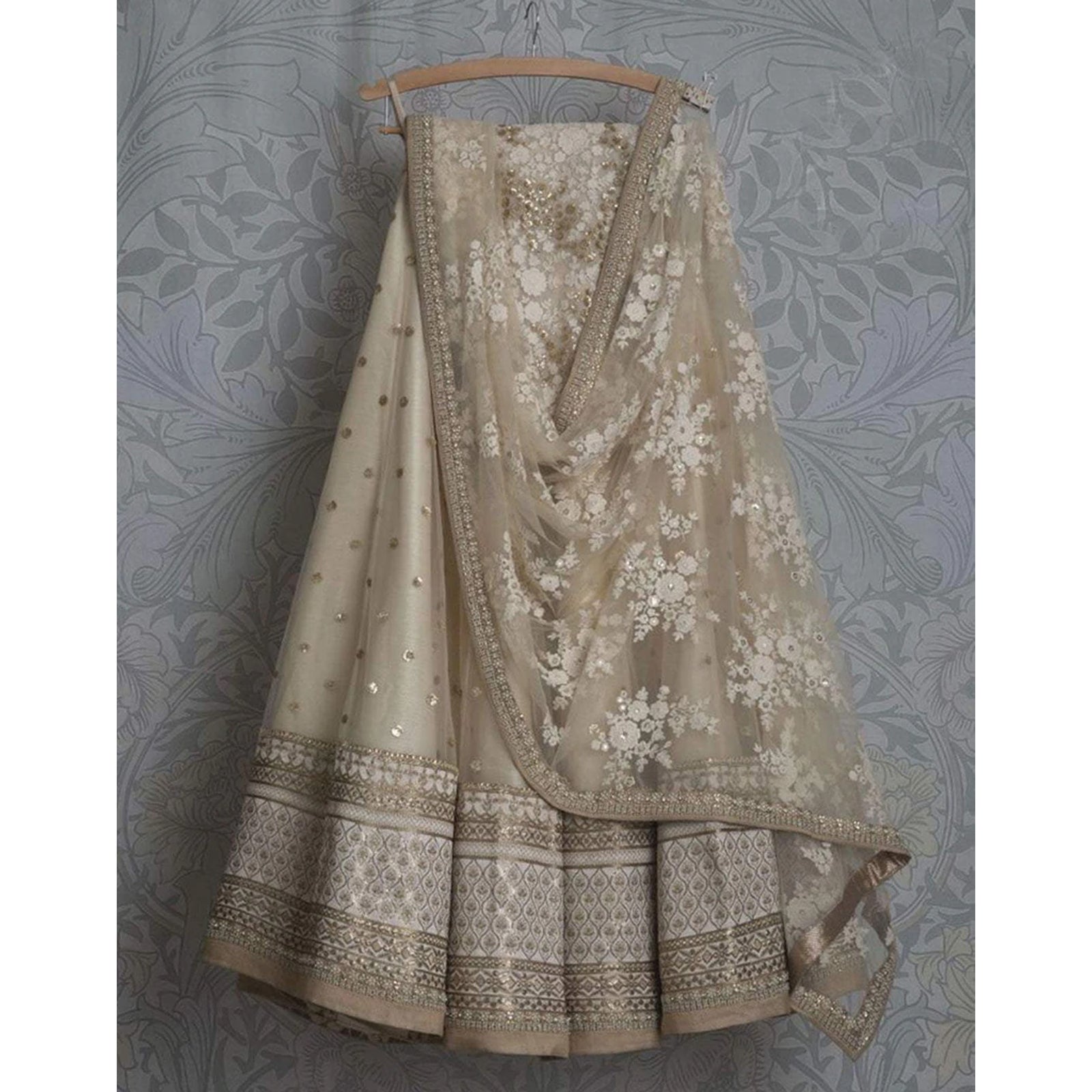 Beige Colored Lehenga Choli with Resham, Zari, and Sequence Work ClothsVilla