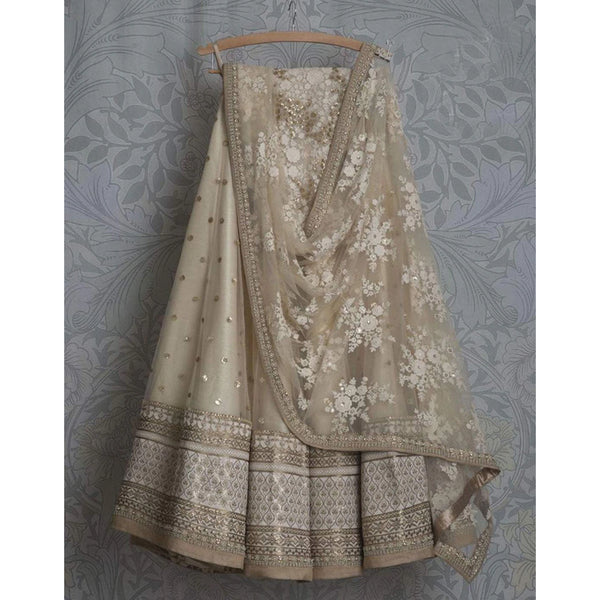 Beige Colored Lehenga Choli with Resham, Zari, and Sequence Work ClothsVilla