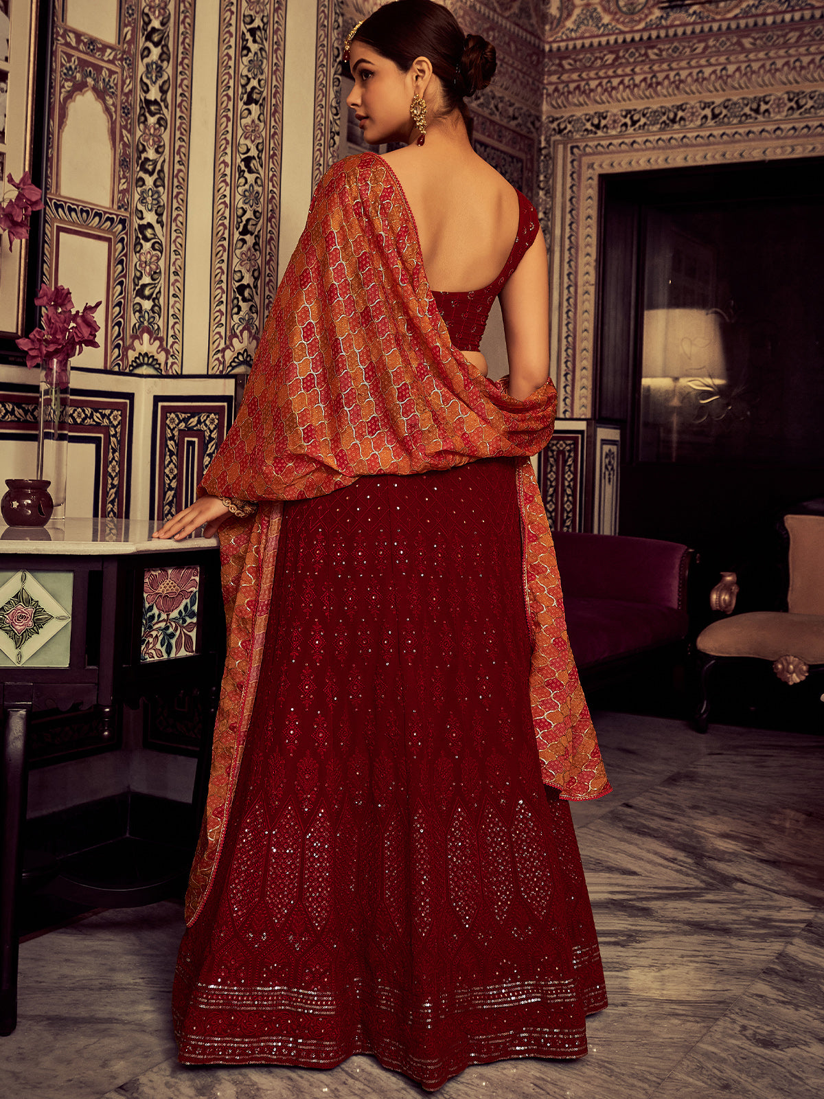 Stylish Maroon Embroidered Georgette Semi Stitched Lehenga With Blouse Piece Clothsvilla