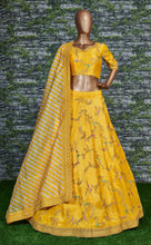Load image into Gallery viewer, Marvelous Yellow Color Bridalwear Embroidered Lehenga Choli ClothsVilla