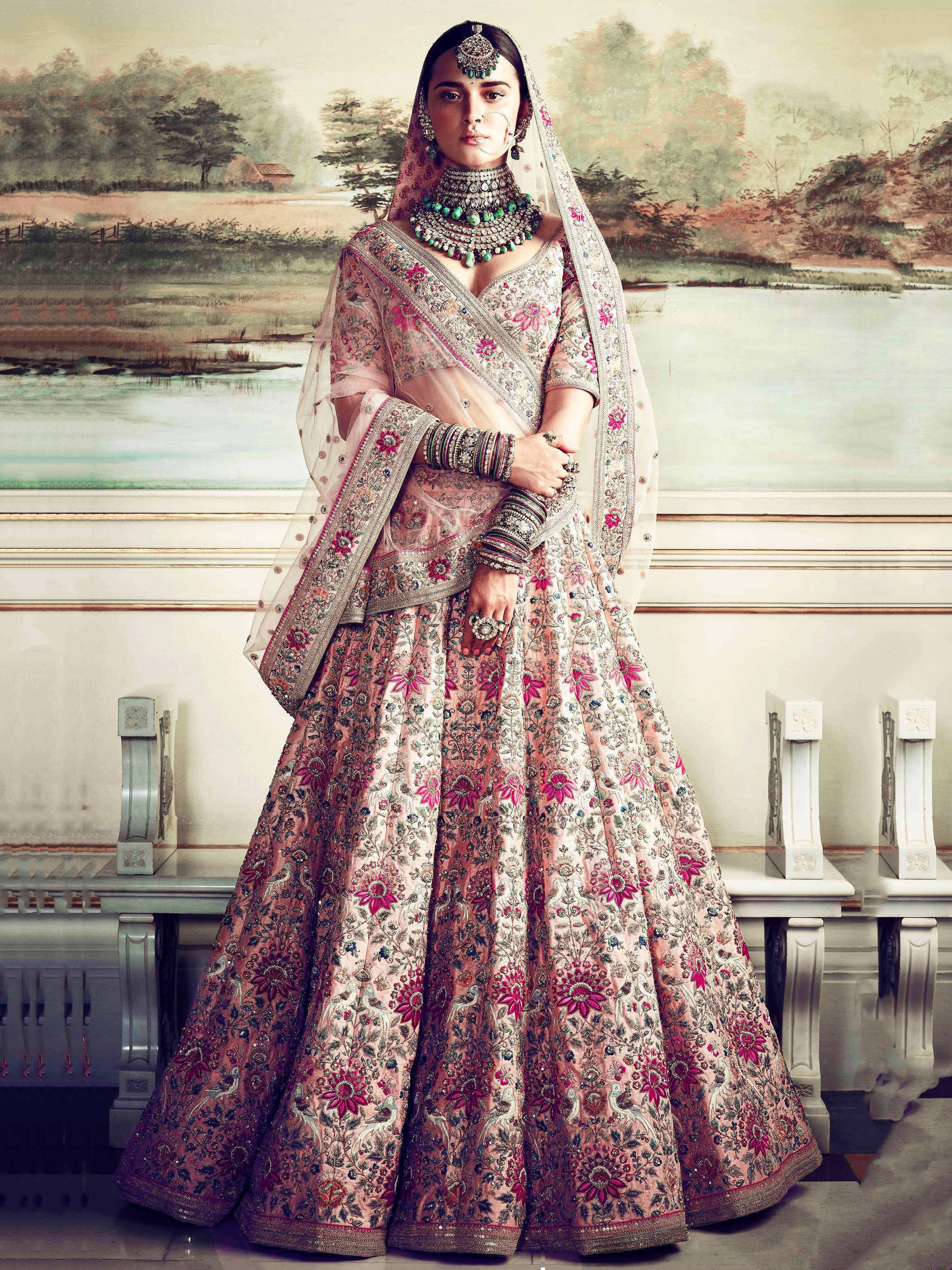 Prominent peach Colored Bridal wear Embroidered Lehenga Choli