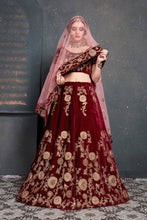 Load image into Gallery viewer, Innovative Maroon Bridal Wear Embroidered Velvet Lehenga Choli ClothsVilla