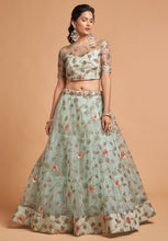 Load image into Gallery viewer, Alluring Sky Blue Thread Embroidery Party Wear Net Lehenga Choli ClothsVilla