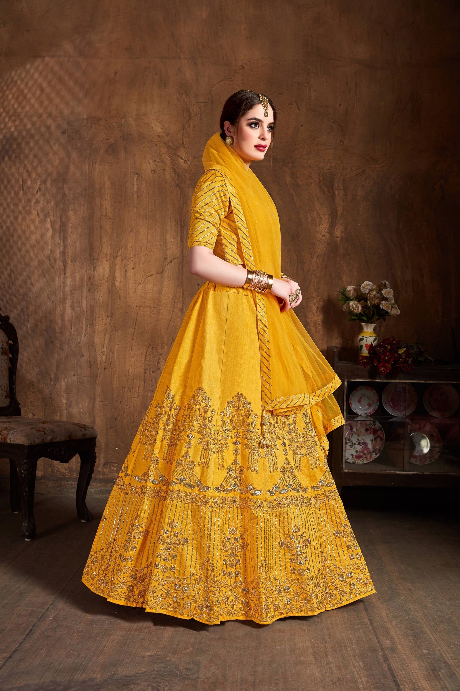 Preferable Yellow Sequins Art Silk Wedding Lehenga Choli ClothsVilla