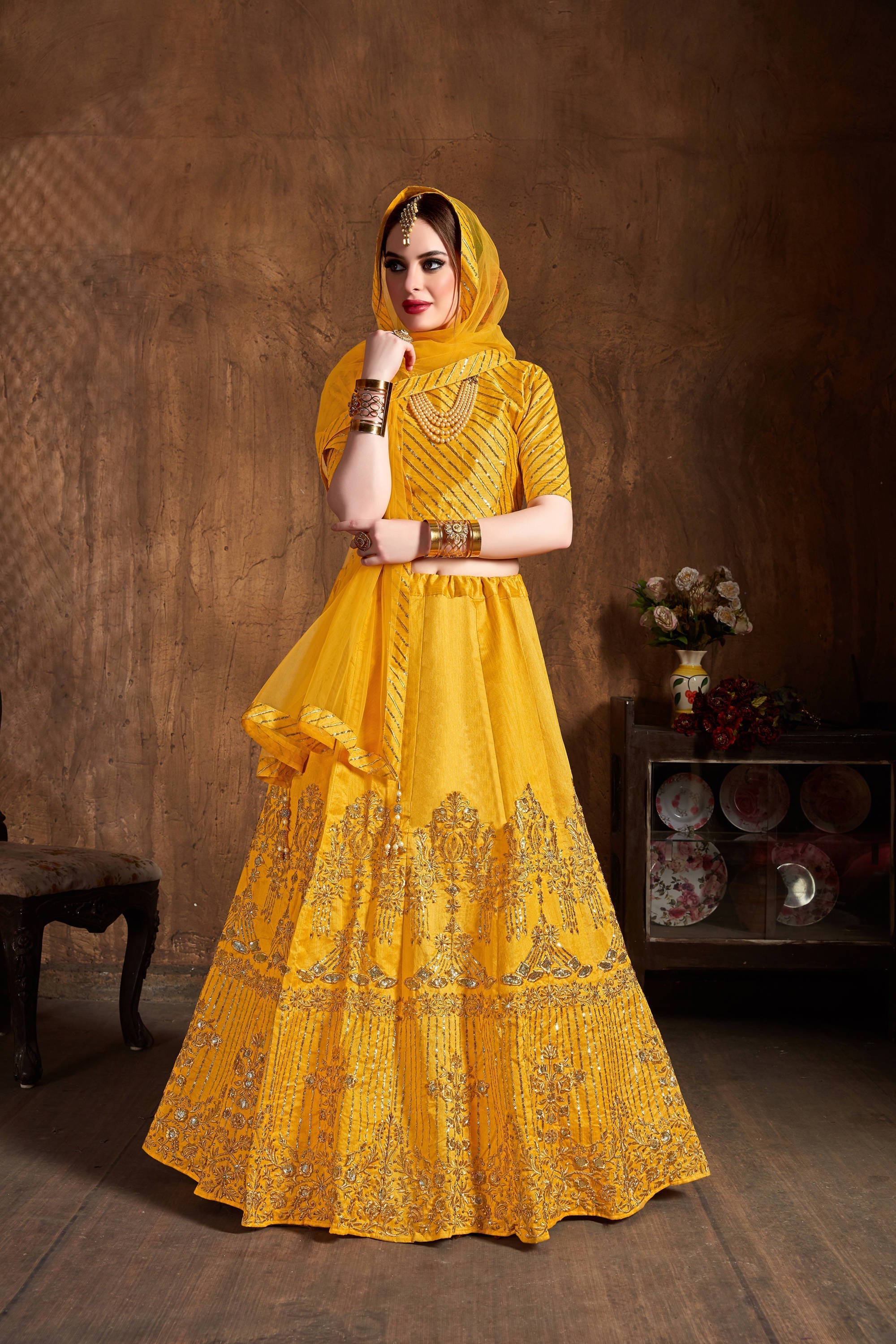 Preferable Yellow Sequins Art Silk Wedding Lehenga Choli ClothsVilla