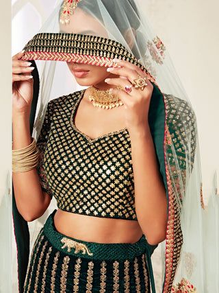 Glorious Bottle Green Heavily Embroidery Velvet Bridal Lehenga Choli With Light Blue Dupatta ClothsVilla