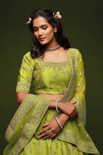Load image into Gallery viewer, Beautiful Neon Green Thread Embroidered Silk Wedding Wear Lehenga Choli ClothsVilla