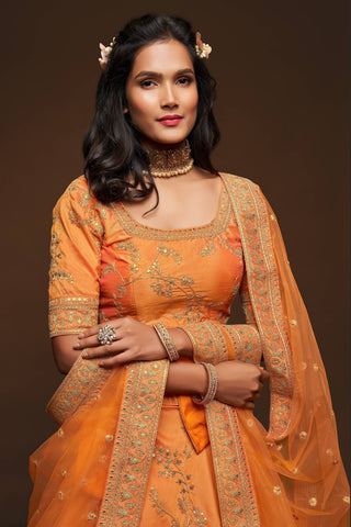 Attractive Orange Thread Embroidered Silk Wedding Wear Lehenga Choli ClothsVilla