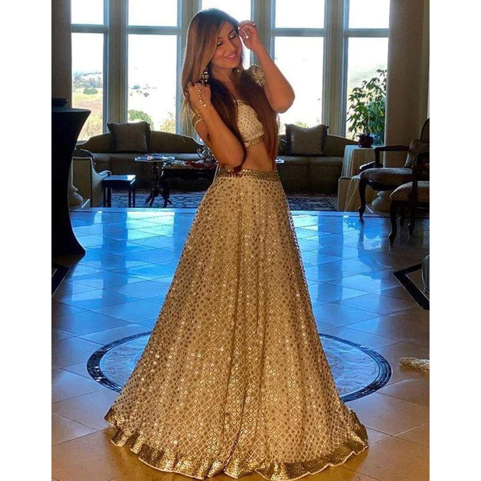 Gold Colored Net Lehenga Choli with Heavy Sequence Work ClothsVilla