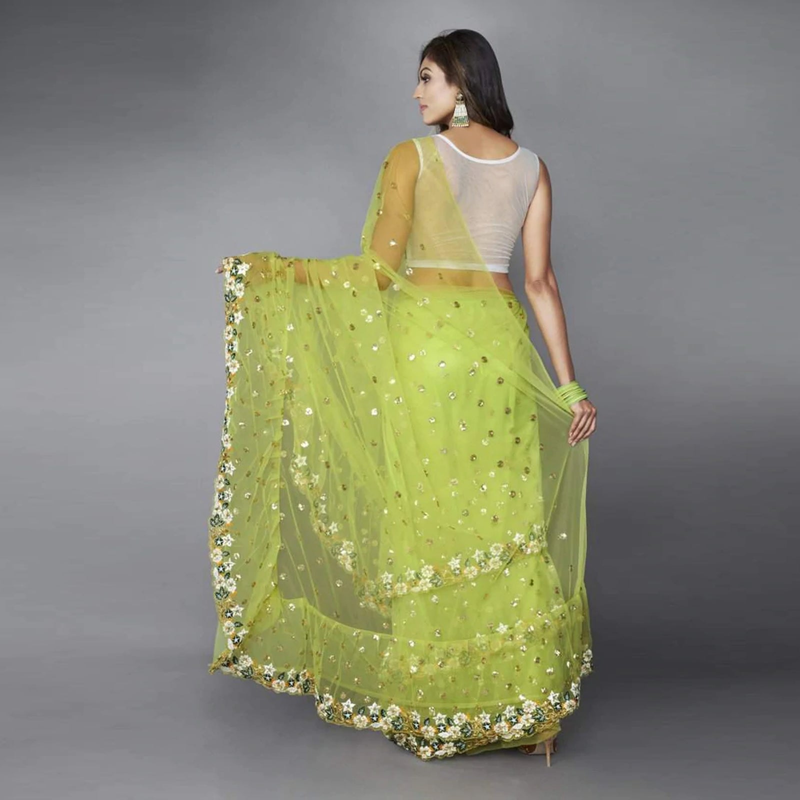 Green Ruffle Saree in Soft Net Fabrics with Embroidery Work ClothsVilla