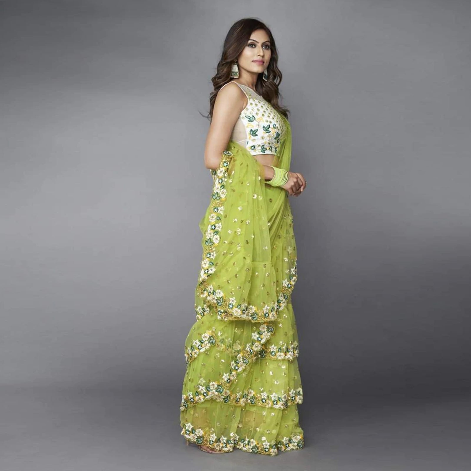 Green Ruffle Saree in Soft Net Fabrics with Embroidery Work ClothsVilla