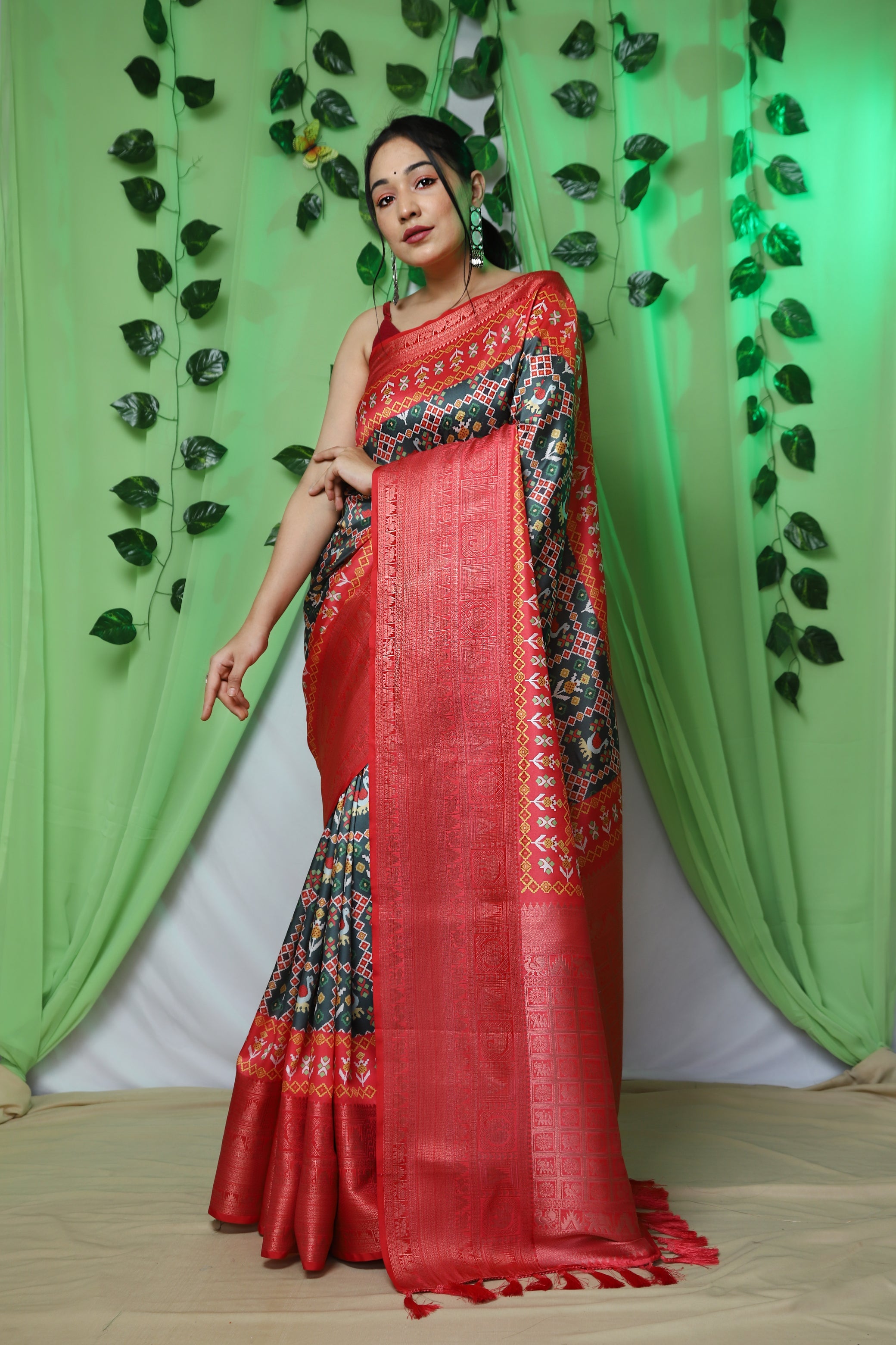 Gala Ikat Patola Printed Woven Saree Green Clothsvilla Main image
