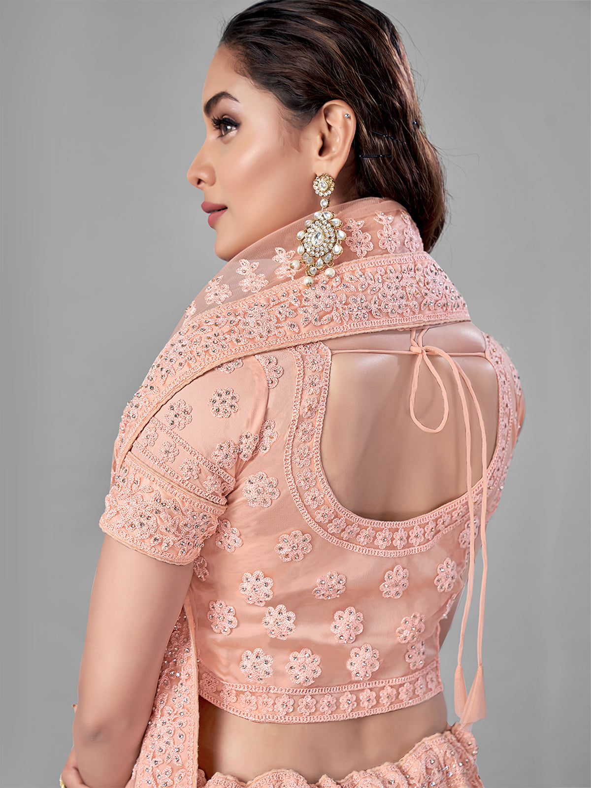 Peach Soft Net Semi Stitched Lehenga With Unstitched Blouse Clothsvilla