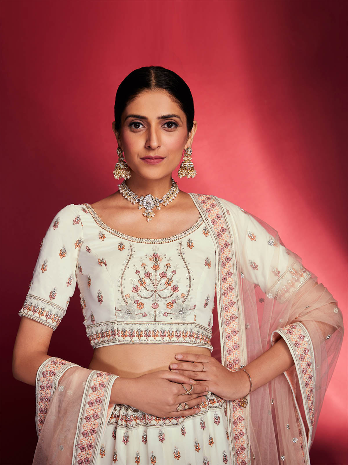 Stunning White Georgette Embroidered Semi Stitched Lehenga Choli Clothsvilla