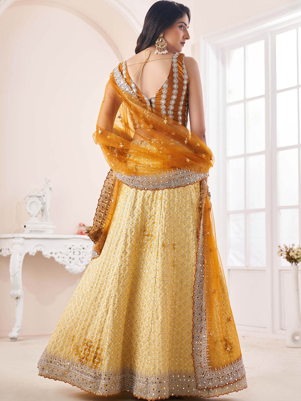 Yellow Georgette Embellished Semi Stitched Lehenga Choli Clothsvilla