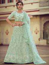 Load image into Gallery viewer, Green Embroidered Soft Net Semi Stitched Lehenga With Unstitched Blouse Clothsvilla