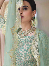 Load image into Gallery viewer, Green Elegant Semi Stitched Lehenga With Unstitched Blouse Clothsvilla