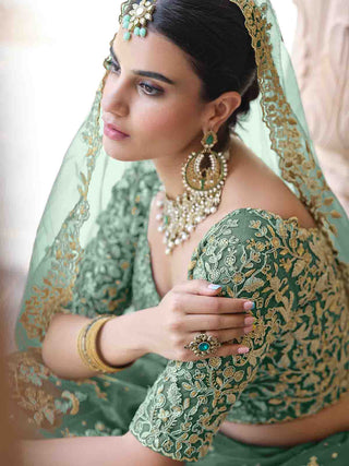 Stylish Dark Green Soft Net Semi Stitched Lehenga With  Unstitched Blouse Clothsvilla