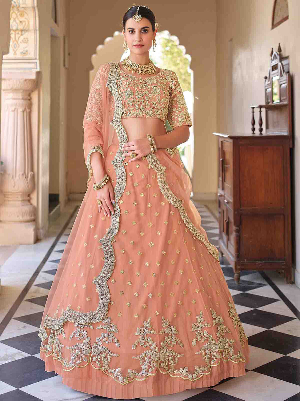 Pretty  Peach Soft Net Semi Stitched Lehenga With  Unstitched Blouse Clothsvilla