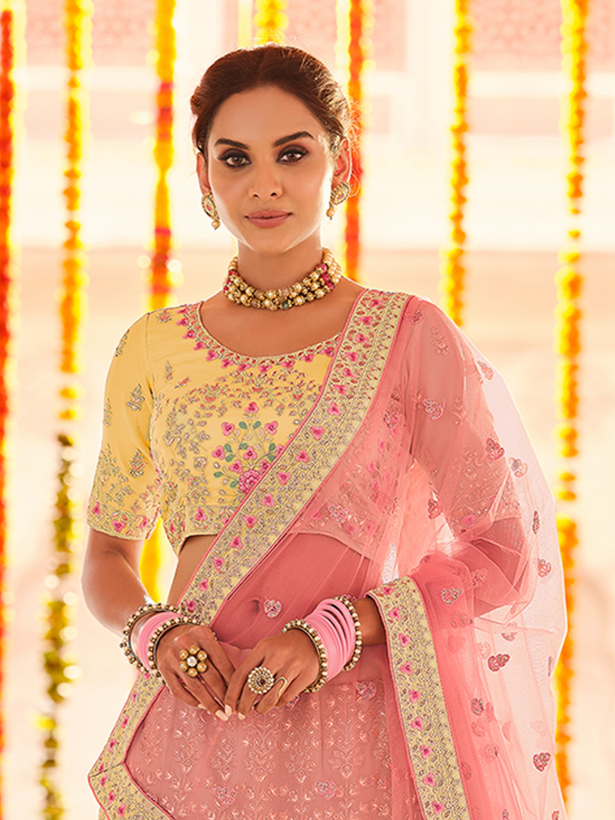 Yellow lehenga and pink blouse set available only at IBFW