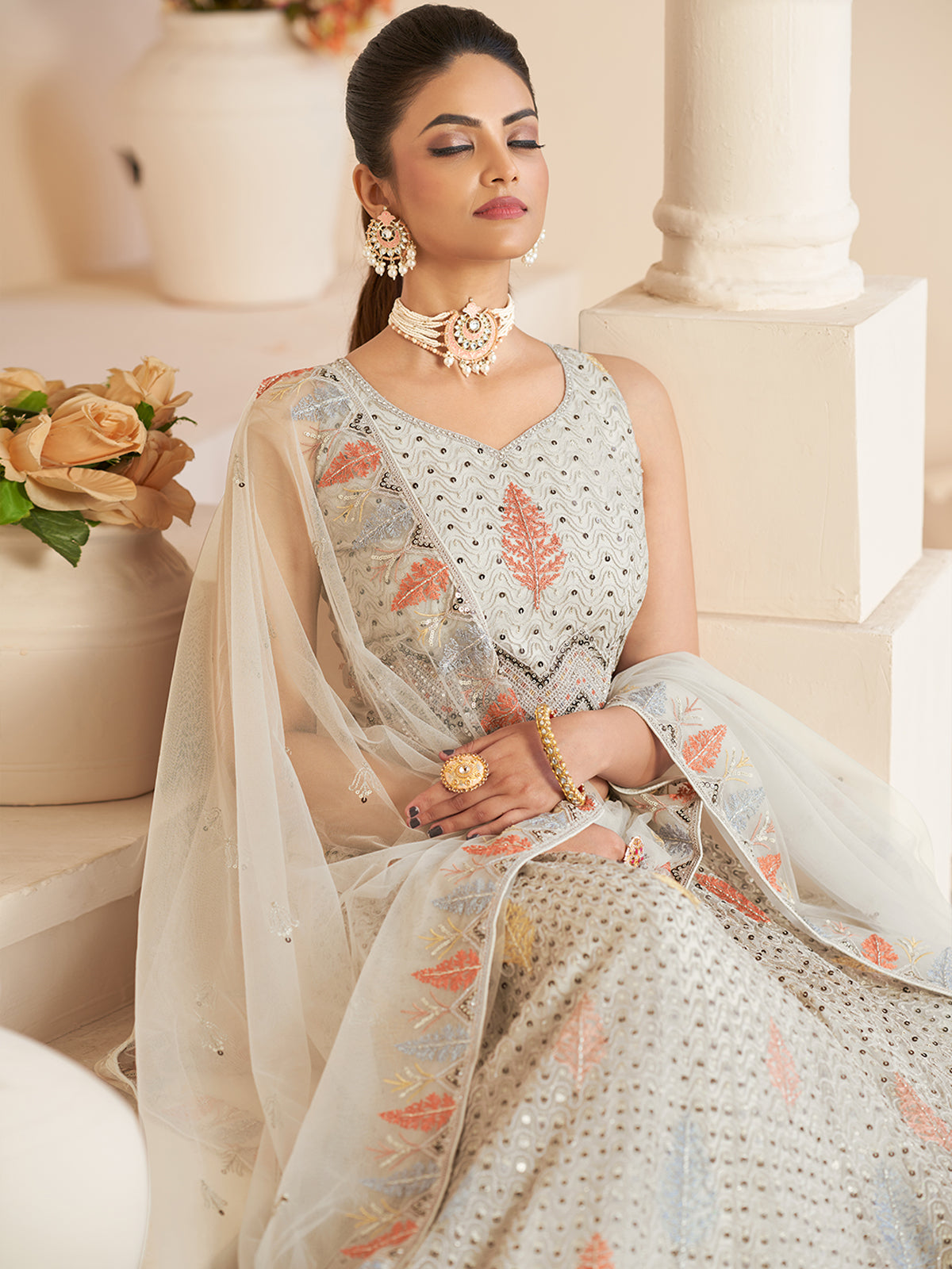 White Net Embroidered Semi stitched Lehenga With Unstitched blouse Clothsvilla