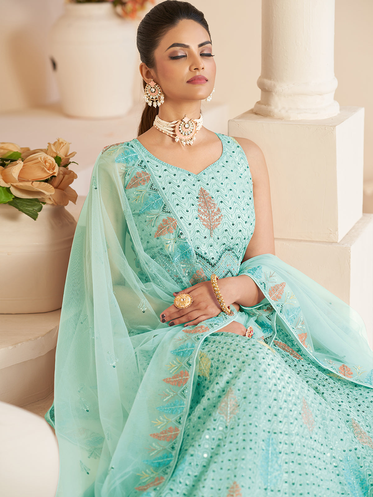 Turquoise Net Embroidered Semi stitched Lehenga With Unstitched blouse Clothsvilla