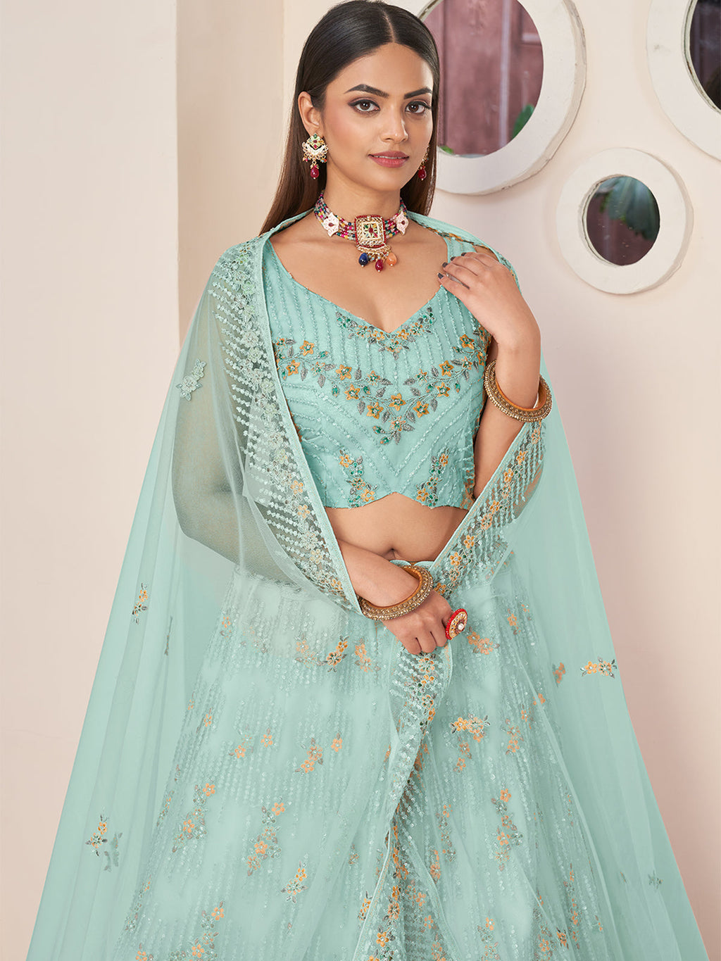 Sky Blue Net Embroidered Semi stitched Lehenga With Unstitched blouse Clothsvilla