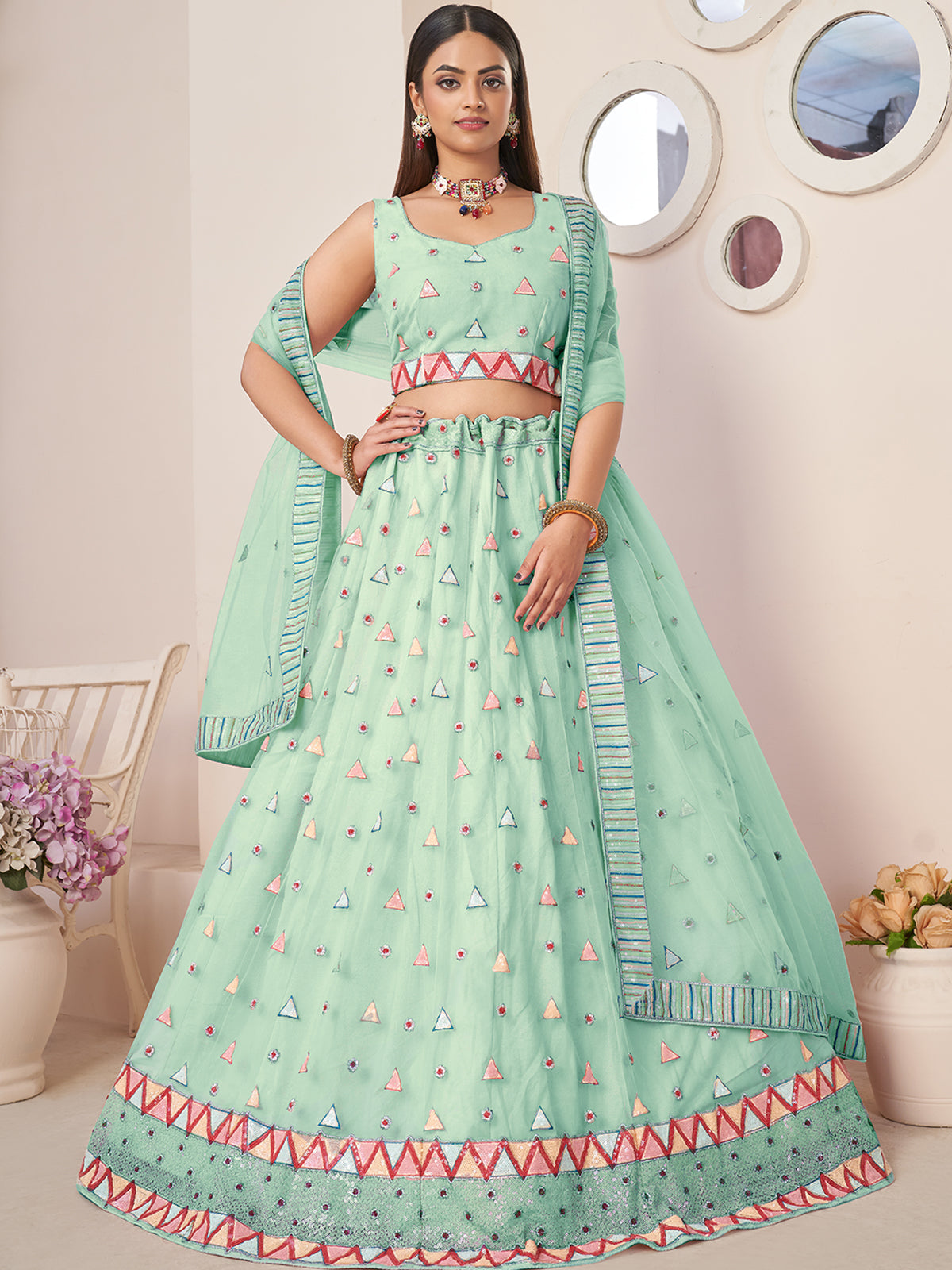 Turquoise Net Embellished Semi stitched Lehenga With Unstitched blouse Clothsvilla Main image