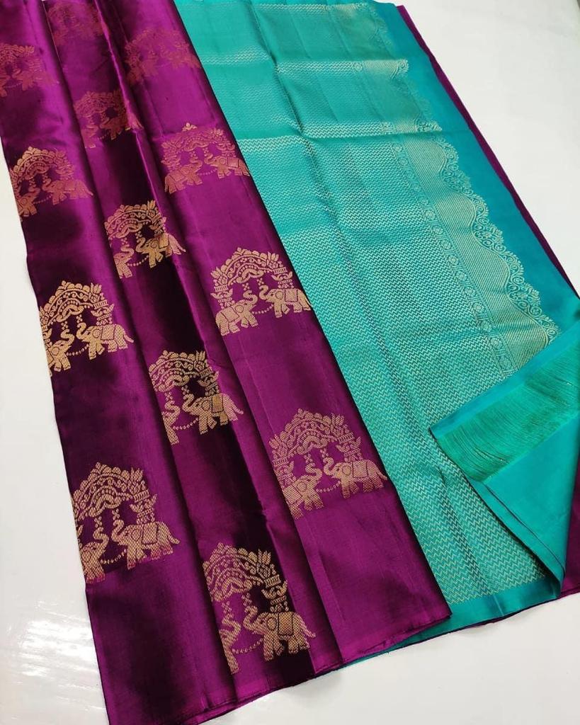 Ethnic Purple Soft Silk Saree With Engrossing Blouse Piece ClothsVilla